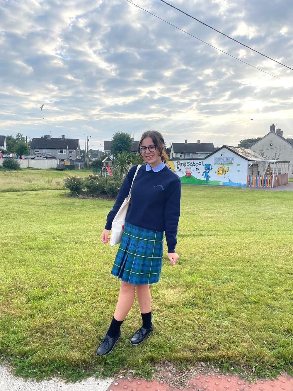 Student in school uniform during a school program in Ireland, experiencing daily life, Irish school culture and integration into the local area.