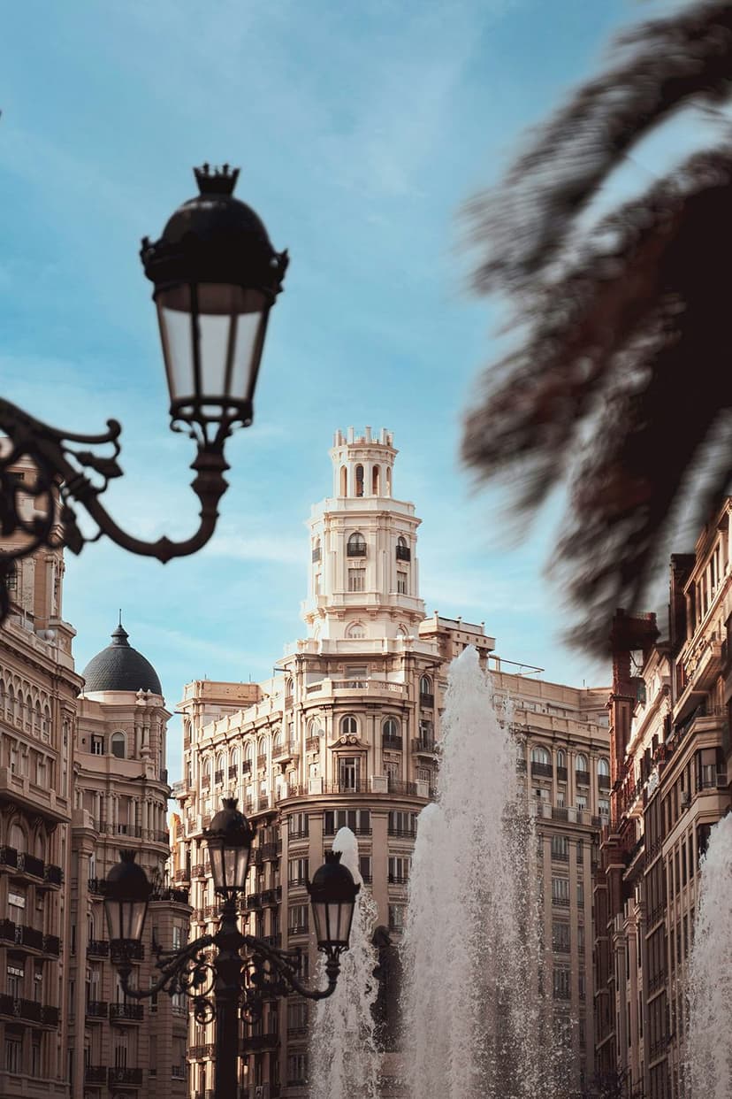 Language stays in Spain among historic buildings, fountains and urban atmosphere in the city centre